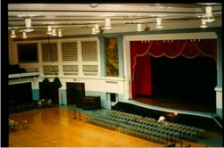 Coliseum in downtown Evansville, view of interior
        stage and organ grill