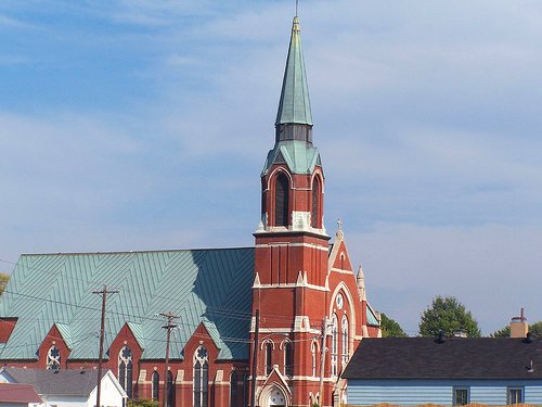 View of
          Holy Name Catholic Church exterior from a distance.